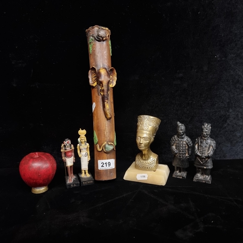 219 - A mixed exotic lot including two terracotta Chinese figures, a brass bust of Nefertiti mounted onto ... 