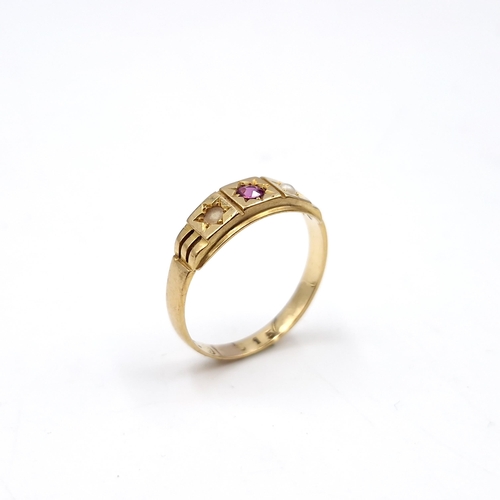 13 - Star lot : An 18 carat gold ruby and seed pearl ring. Ring size - R. Weight - 3.51 grams. Boxed. mis... 