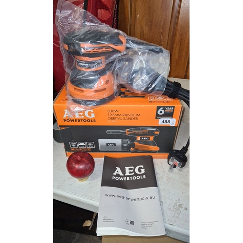 A brand new AEG 125mm Random Orbital Sander, 300W. Includes manual and power cord. RRP €339 brand new in packaging.