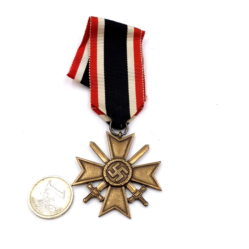 677 - A WWII Germany 1939 war merit cross medal, class II.