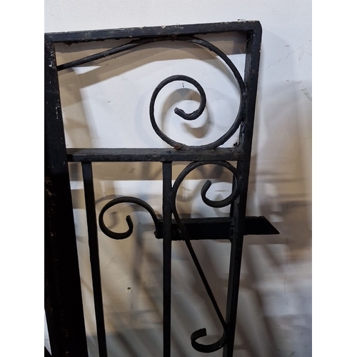 684 - Star Lot : Wrought iron gate from the 20th century features ornate scrollwork and a black finish, me... 