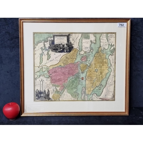 702 - A vintage print of a 1730 map of Stockholm, Sweden. Housed in a gilt frame behind glass with framer'... 