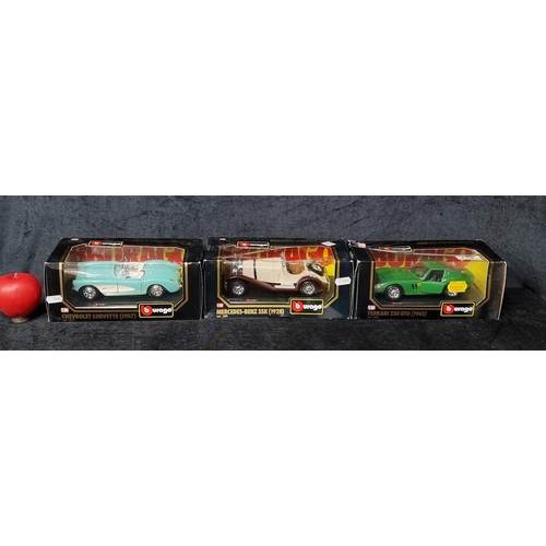 719 - Three collectible as new in box die cast metal Burago model cars including a 1962 Ferrari 250 GTO, a... 