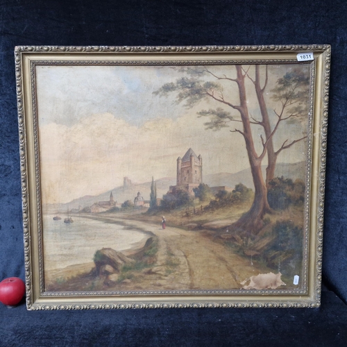 1239 - Star Lot: A large original antique oil on canvas painting. Features a charming riverside town, with ... 