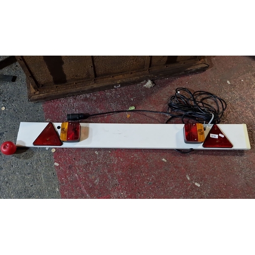 1253 - White trailer lighting board with integrated red and amber lights, featuring a long cable and plug a... 