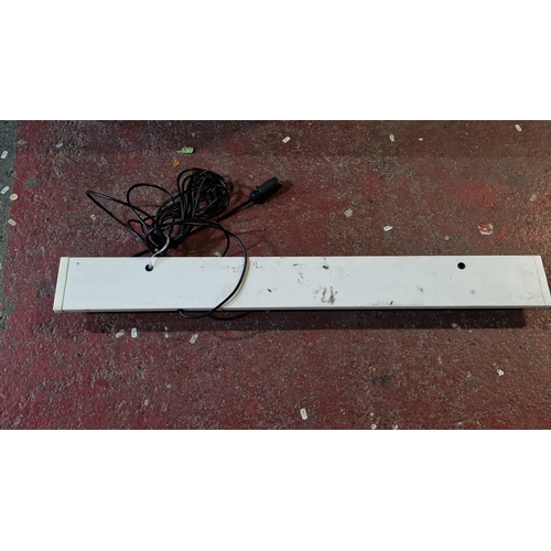 1253 - White trailer lighting board with integrated red and amber lights, featuring a long cable and plug a... 