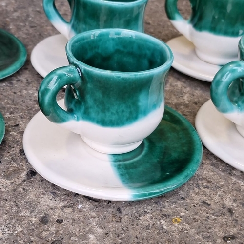 1255 - Ceramic green and white art studio pottery tea set, featuring a teapot, creamer, sugar bowl, and six... 