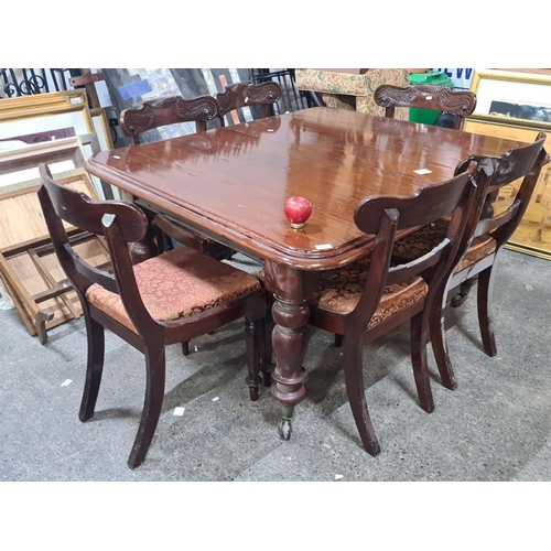 1257 - Star lot : A victorian Mahogany dining set includes a polished rectangular table and four chairs wit... 