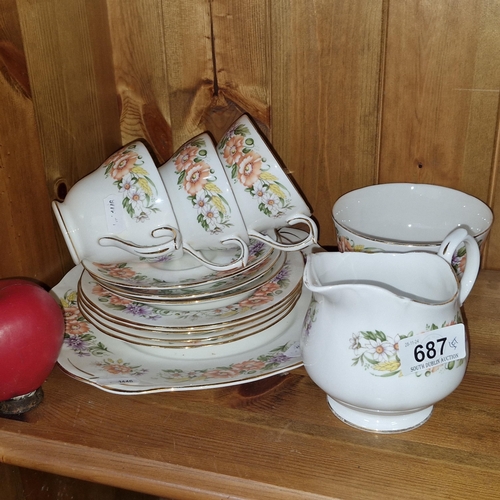 1267 - A very pretty Duchess Bone part teaset. From a countryside collection. Includes cups, saucers, sugar... 