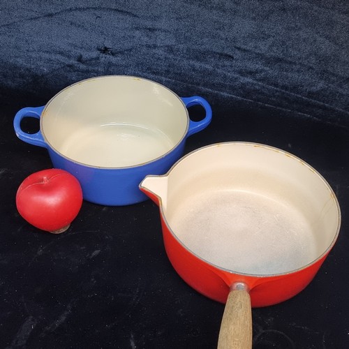 172 - Two cast iron Le Creuset items including a lidded casserole dish and lidded saucepan. Both in very g... 