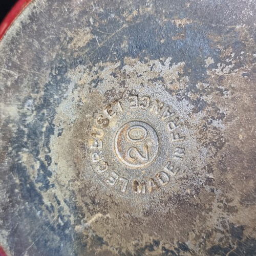 172 - Two cast iron Le Creuset items including a lidded casserole dish and lidded saucepan. Both in very g... 