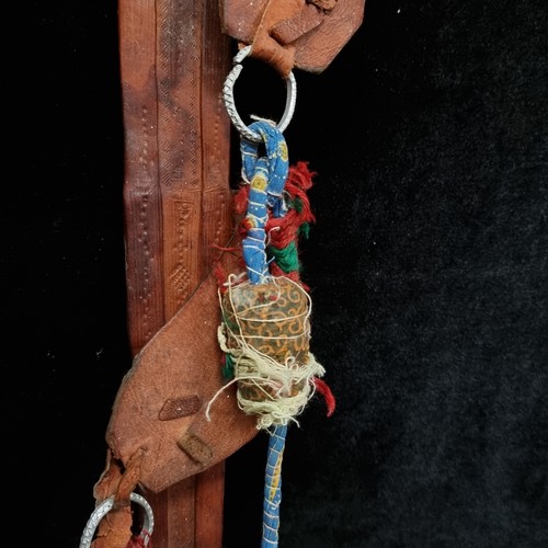 103 - Star Lot : A mid 20th century African turareg sword and scabbard. Selling online for €250+. (damage ... 