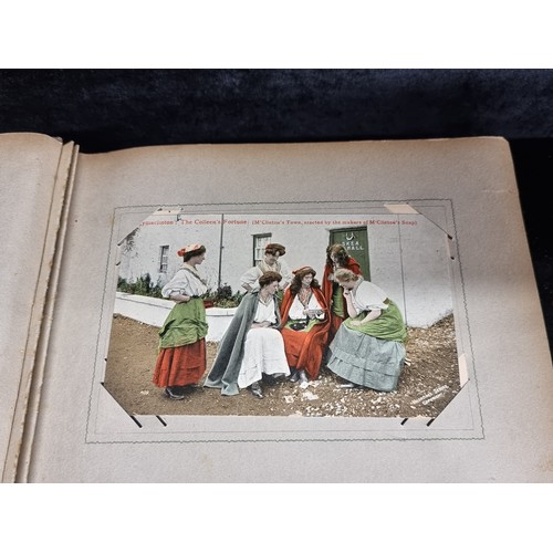 94 - A fabulous antique fully furnished post card album containing antique Irish post cards.