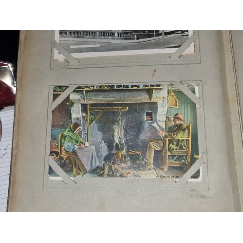 94 - A fabulous antique fully furnished post card album containing antique Irish post cards.