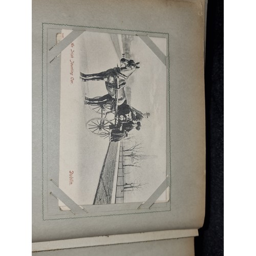 94 - A fabulous antique fully furnished post card album containing antique Irish post cards.