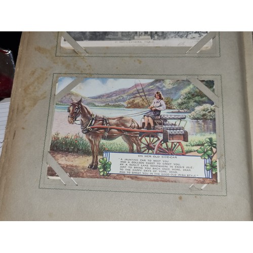 94 - A fabulous antique fully furnished post card album containing antique Irish post cards.