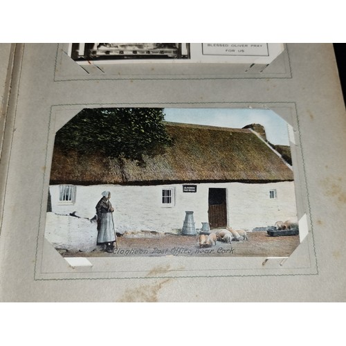 94 - A fabulous antique fully furnished post card album containing antique Irish post cards.