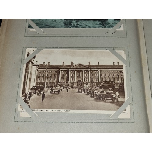 94 - A fabulous antique fully furnished post card album containing antique Irish post cards.