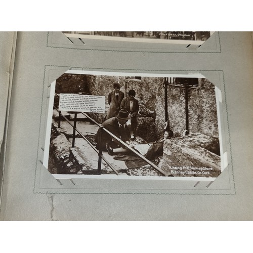 94 - A fabulous antique fully furnished post card album containing antique Irish post cards.