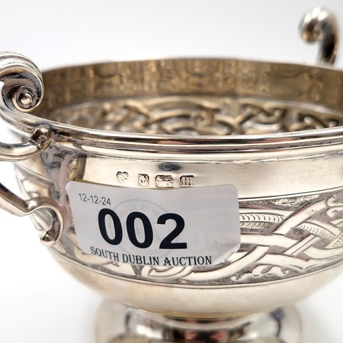 2 - Star Lot : A very attractive celtic designed chalice with scroll handles hallmarked Birmingham. Dime... 