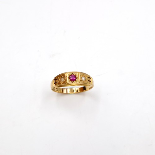 13 - Star lot : An 18 carat gold ruby and seed pearl ring. Ring size - R. Weight - 3.51 grams. Boxed. mis... 