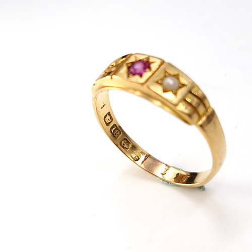 13 - Star lot : An 18 carat gold ruby and seed pearl ring. Ring size - R. Weight - 3.51 grams. Boxed. mis... 