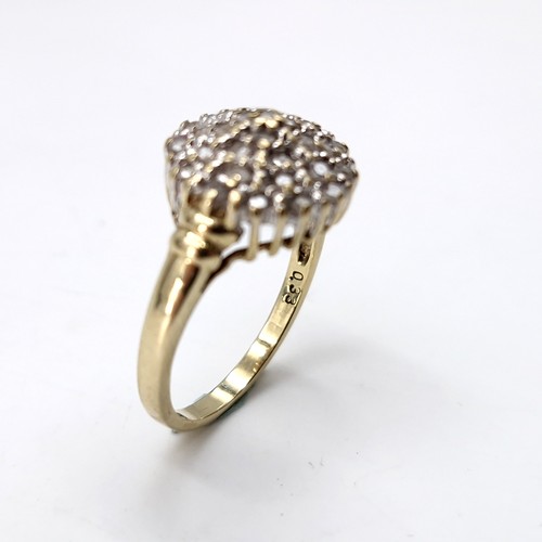 30 - Star Lot : A pretty nine carat gold diamond cluster ring. Size - N. Weight - 3.37 grams.