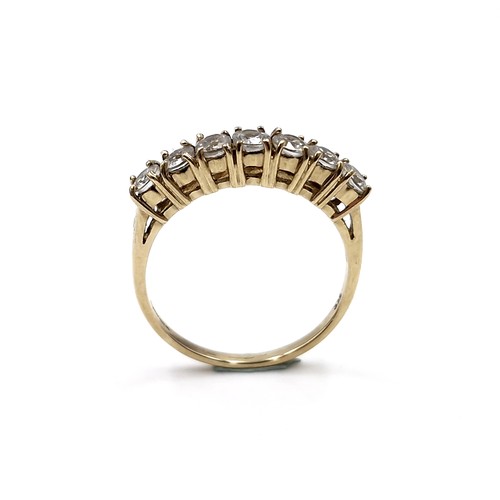 37 - Super Star Lot : A nice example of a nine carat gold seven stone diamond half eternity ring. Est. we... 