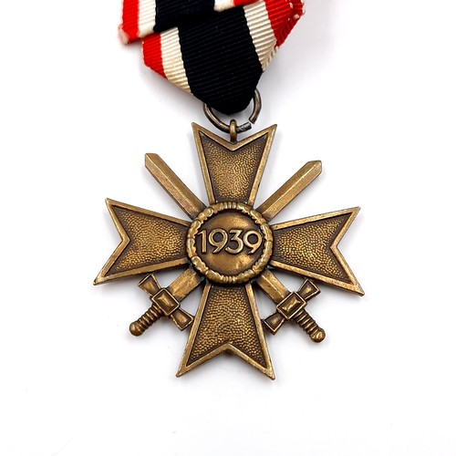 677 - A WWII Germany 1939 war merit cross medal, class II.