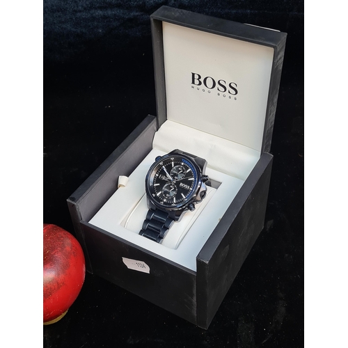 118 - A Designer Hugo Boss Water resistant watch. Model 1513824 Globetrotter with stainless steel strap an... 