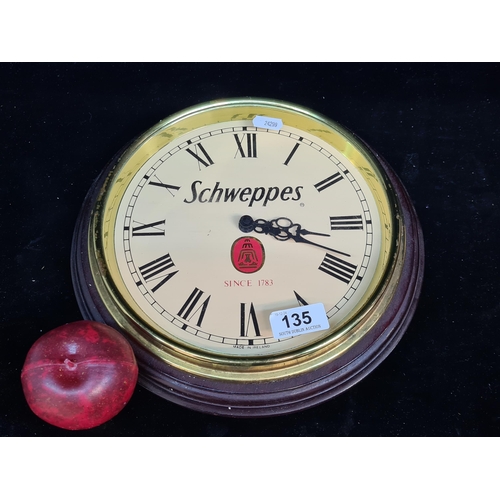 135 - A vintage Schweppes branded wall clock with quartz Swiss made battery mechanism. Clock made in Sligo... 