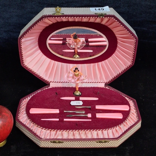 149 - A pretty vintage Lador Swiss made musical box with manicure set. Features dancing ballerina with pin... 