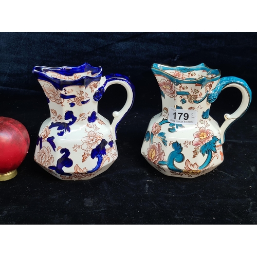 179 - A pair of Mason's Ironstone pitcher jugs, featuring the Mandalay and Java patterns. Both printed and... 