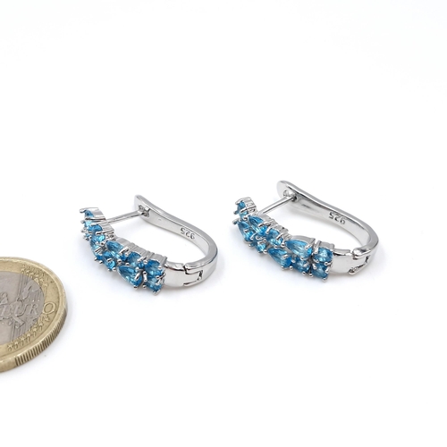 17 - A pretty pair of blue topaz earrings suitable for pierced ears. Weight - 5.9 grams.