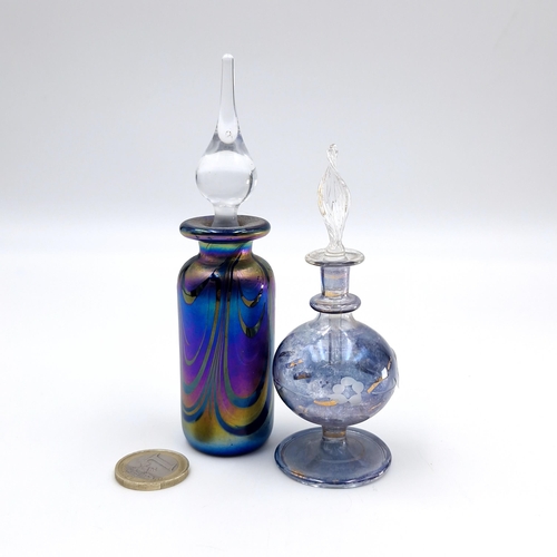 36 - Two items - A middle eastern perfume bottle together with a further example with mystic topaz colour... 