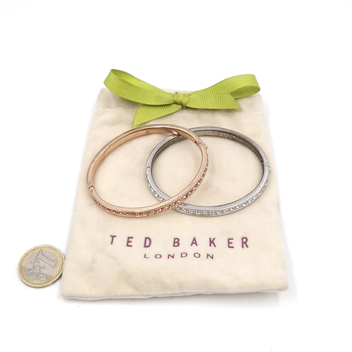 60 - A Ted Baker bracelet, with another example. Comes in original pouch.