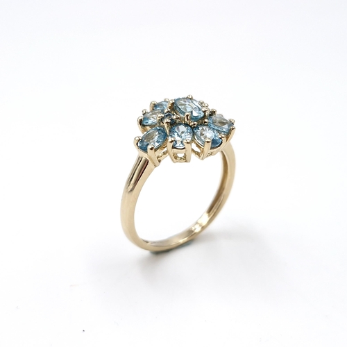 8 - Star lot : A nine carat gold topaz cluster ring. Size - L. Weight - 2.53 grams.