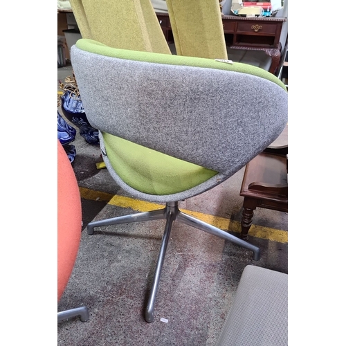 415 - Star Lot : A fabulous pair of Boss design Retro swivel chairs, vibrant upholstery, sleek chrome base... 