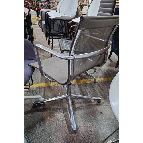 417 - Star Lot : A Super mesh office swivel Eames chair by ICF with chrome frame, ICF label to the base. I... 