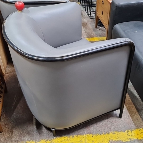 420 - Star Lot : Pair of modern grey leather club chairs with sleek black frames.