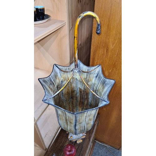 448 - Vintage umbrella stand with ornate cast iron base, shaped like an umbrella. Striking decorative piec... 