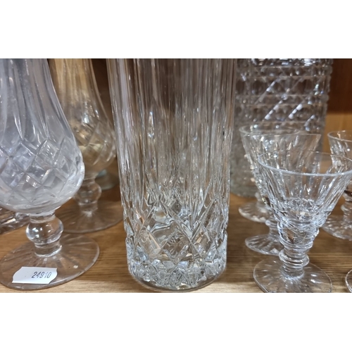 461 - An array of cut crystal and cut glass pieces including Waterford Crystal examples.