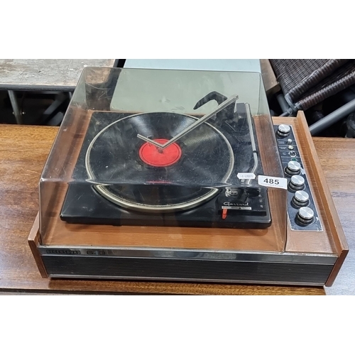 485 - Garrard Model 2025T turntable, circa 1960s. Vintage wooden casing, manual/auto operation.