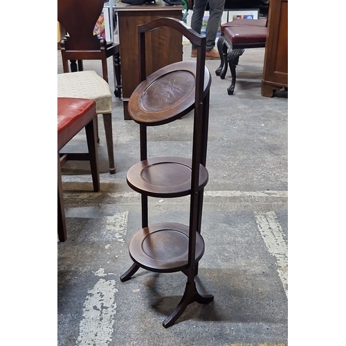 837 - Edwardian mahogany folding cake stand, from the early 20th century. Features elegant plate slots.  f... 