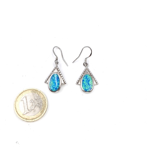 575 - A pair of sterling silver hallmarked opal earrings - suitable for pierced ears. Weight - 5.9 grams. ... 