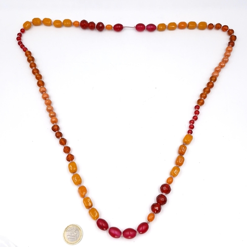 577 - An ethnic bead necklace. Length - 100 cms. Weight - 144 grams. Stones cold to touch, including Buter... 