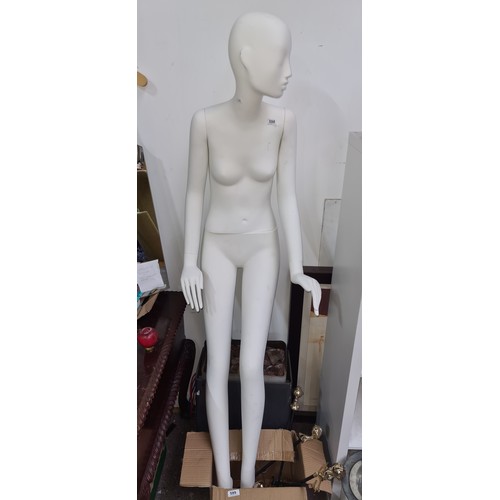 598 - A full size female great quality mannequin featuring clothing brand plaque Columbia. made for sittin... 