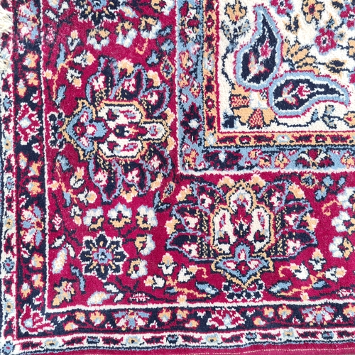 947 - Star lot : A lovely full room size rug. With dark red on a cream ground. Traditional style. 
MM: 200... 