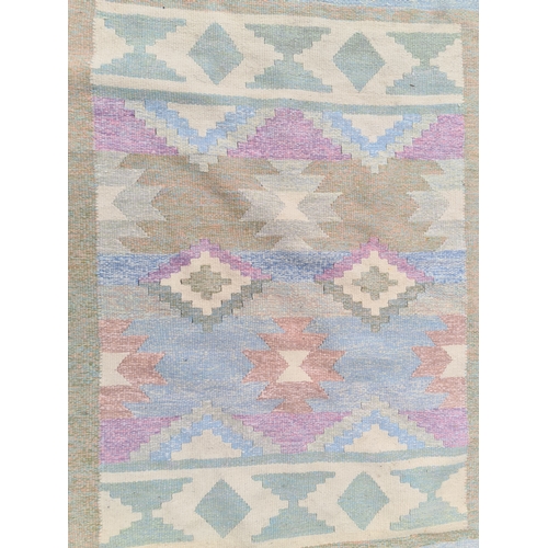 951 - A lovely Afghan Kilim floor in soft pastel colours. All hand knotted, will hold up to wear and retai... 