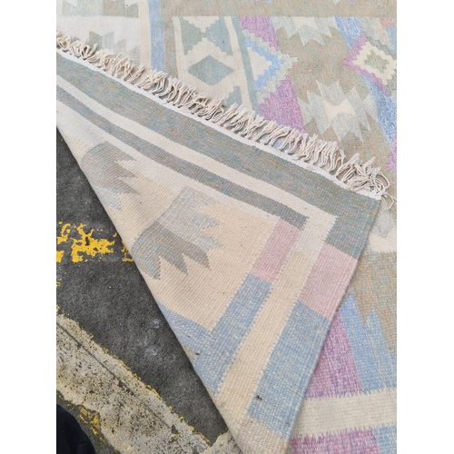 951 - A lovely Afghan Kilim floor in soft pastel colours. All hand knotted, will hold up to wear and retai... 